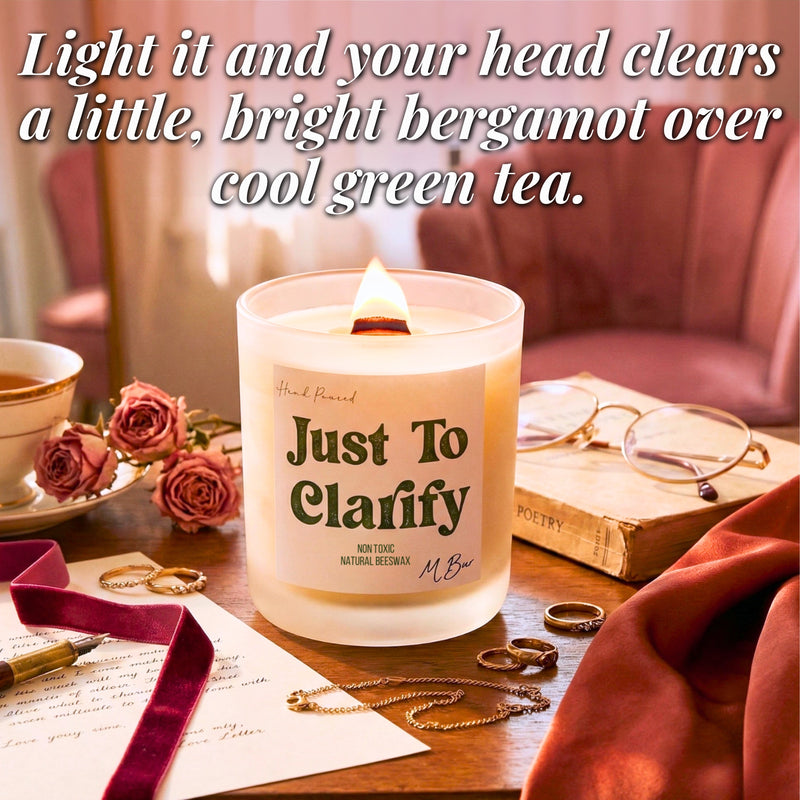 Lit Just To Clarify beeswax candle with wooden wick on styled desk