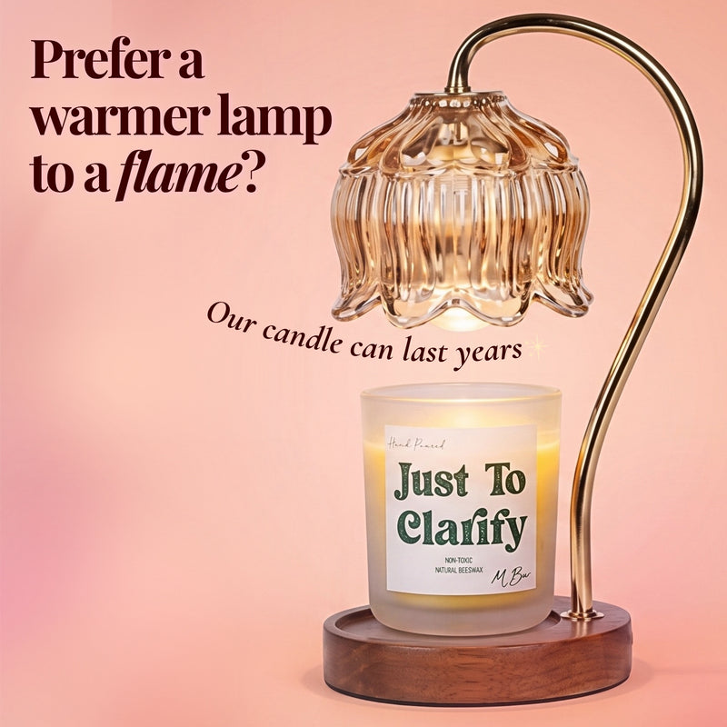 Just To Clarify beeswax candle under floral glass warmer lamp