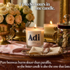 Lit Adi beeswax candle in frosted glass with roses