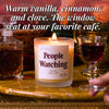 Lit People Watching beeswax candle with wine and decanter