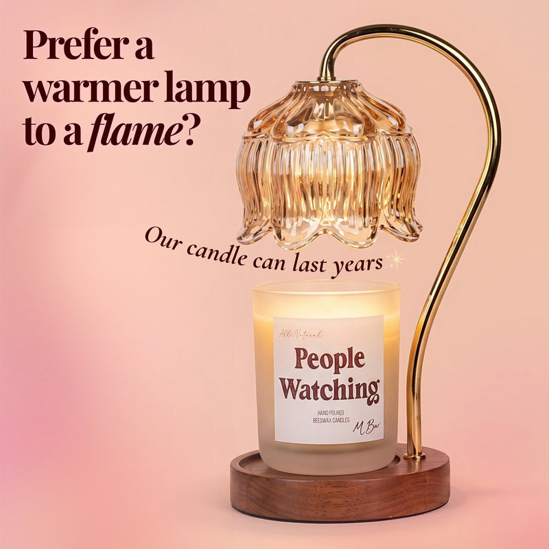 People Watching beeswax candle under flower-shaped warmer lamp