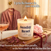 Lit Sunday Reset beeswax candle on bath tray with roses