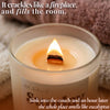 Lit beeswax candle with crackling wooden wick and cozy blankets