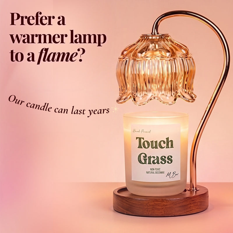 Touch Grass beeswax candle under glass warmer lamp