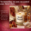 Lit Retail Therapy beeswax candle with wooden wick on vanity