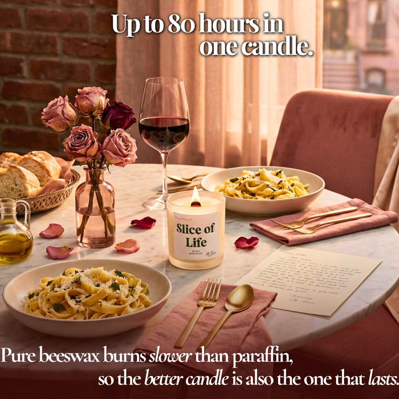 Lit Slice of Life beeswax candle on romantic pasta dinner table
